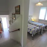 Patrizia Villa *